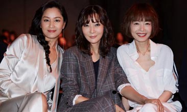 <b>柯蓝现身好友秀场 玩转格纹复古格调</b>